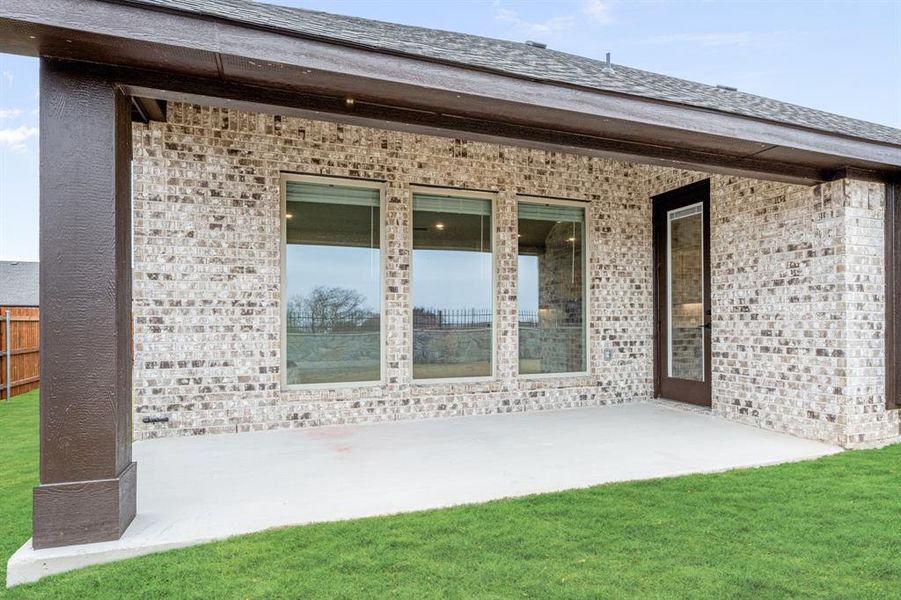 Exterior details and patio area of a home in Sunrise at Garden Valley, Waxahachie (Image 28).