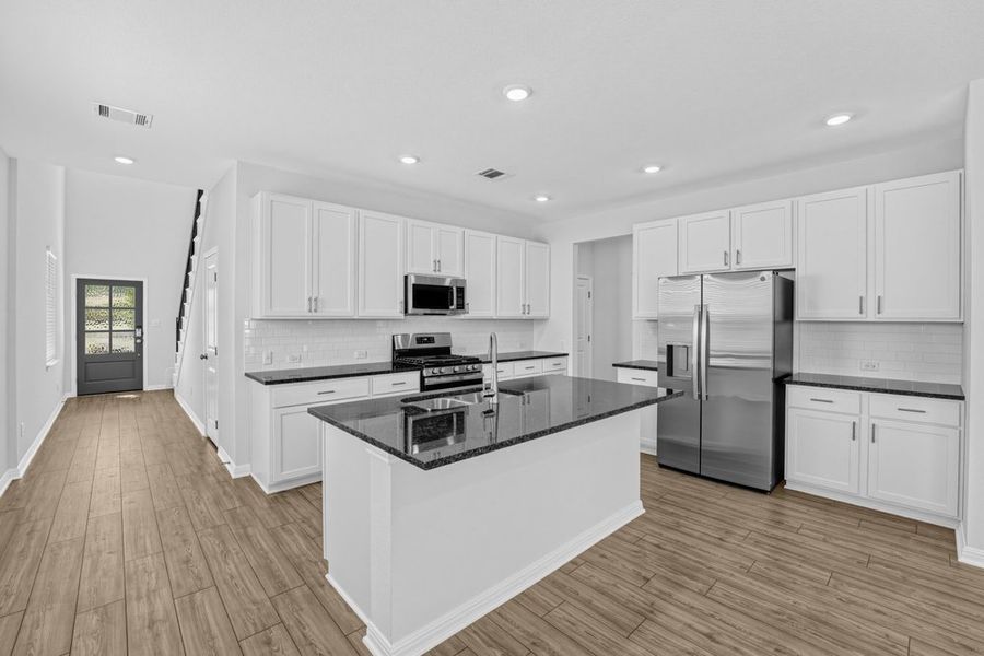 Furnished interior view inside a new home in Sunfield, Buda (Image 5).