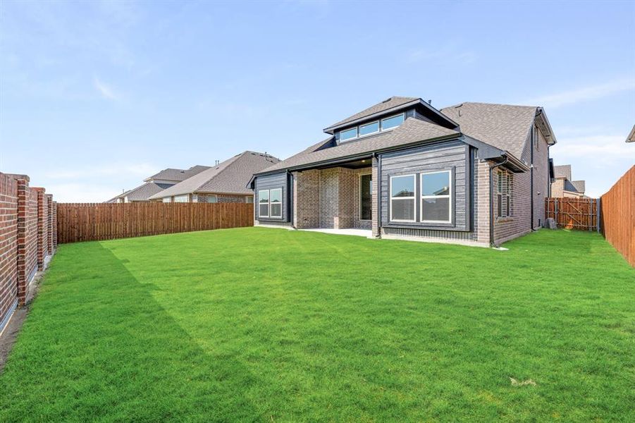 Exterior details and patio area of a home in Country Lakes Classic 60, Argyle (Image 3). Exterior details and patio area of a home in Country Lakes Classic 60, Argyle (Image 3).