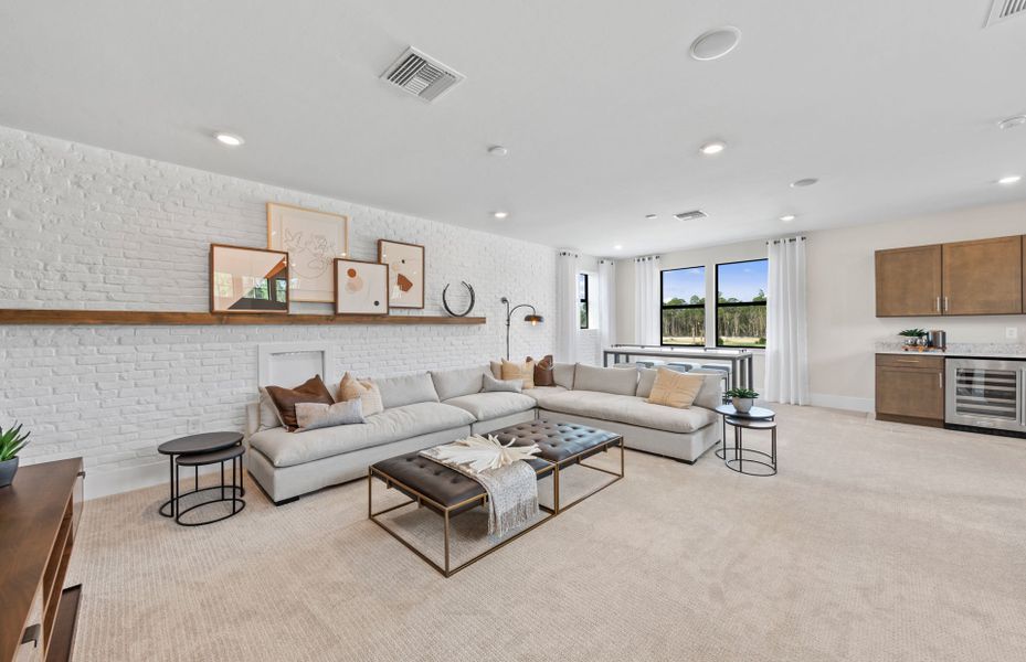 Representative furnished interior of a home built from the Layton Grand by Del Webb in Del Webb Explore North River Ranch, Parrish (Image 22).