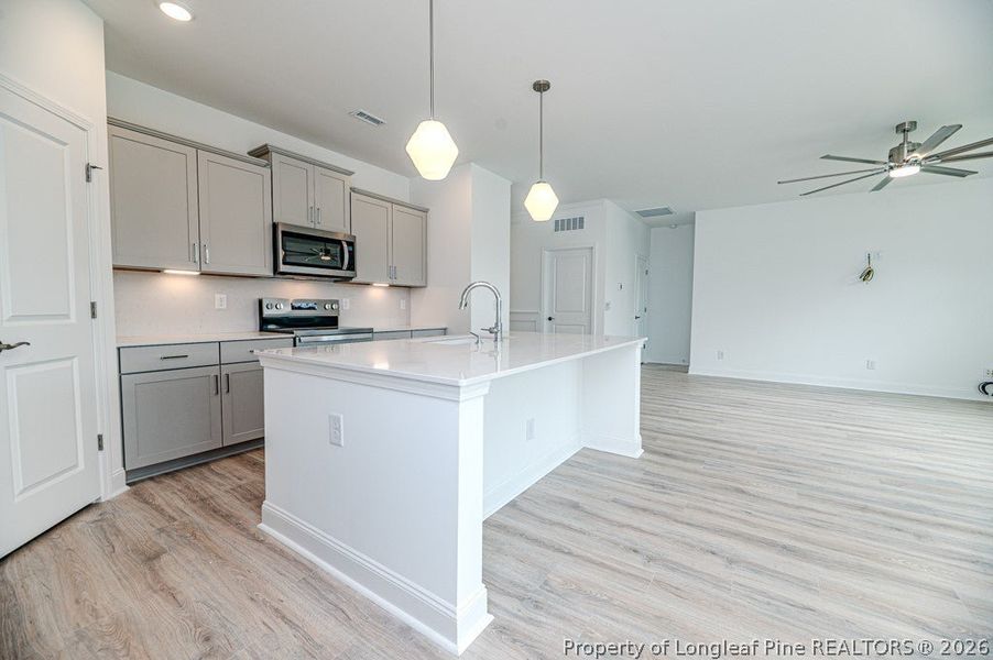 Furnished interior view inside a new home in The Cottages at 78 North, Sanford (Image 6). Furnished interior view inside a new home in The Cottages at 78 North, Sanford (Image 6).