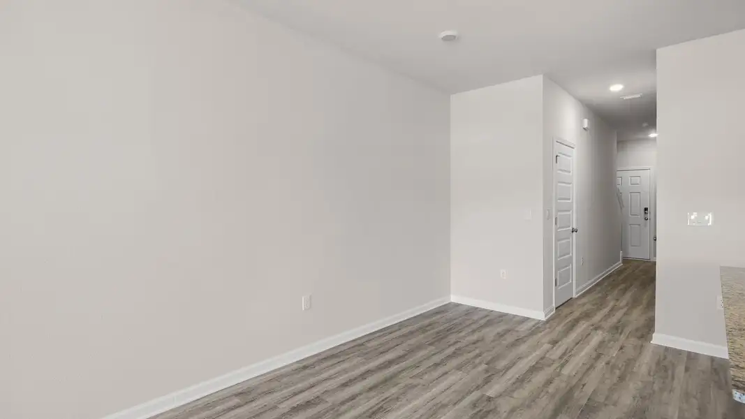 Representative unfurnished interior of a home built from the The Canmore by D.R. Horton in Salt Pines, Port Saint Joe (Image 16).