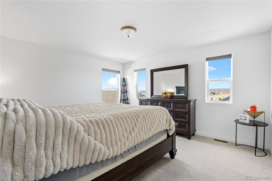 Furnished interior view inside a new home in Ascent Village at Sterling Ranch - Single Family Homes, Littleton (Image 29). Furnished interior view inside a new home in Ascent Village at Sterling Ranch - Single Family Homes, Littleton (Image 29).