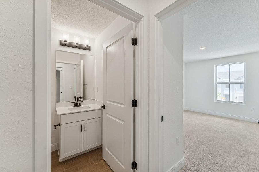 Furnished interior view inside a new home in Salerno Reserve Townhomes, Stuart (Image 14).