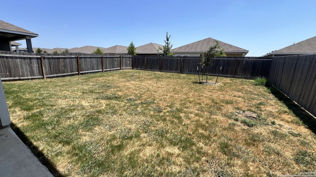 Front exterior of a new home in Trails at Culebra, San Antonio, TX, highlighting curb appeal (Image 15).