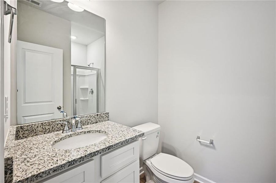 Furnished interior view inside a new home in The Hills at Cedar Creek, Winder (Image 16).