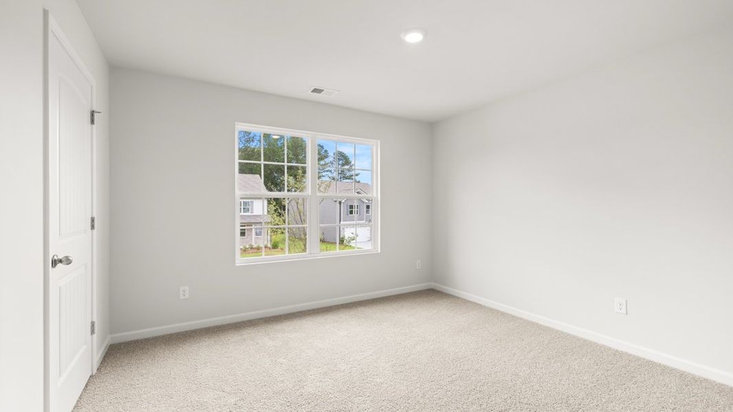 Representative unfurnished interior of a home built from the Hayden by D.R. Horton in Northwoods at Mirror Lake, Villa Rica (Image 34).