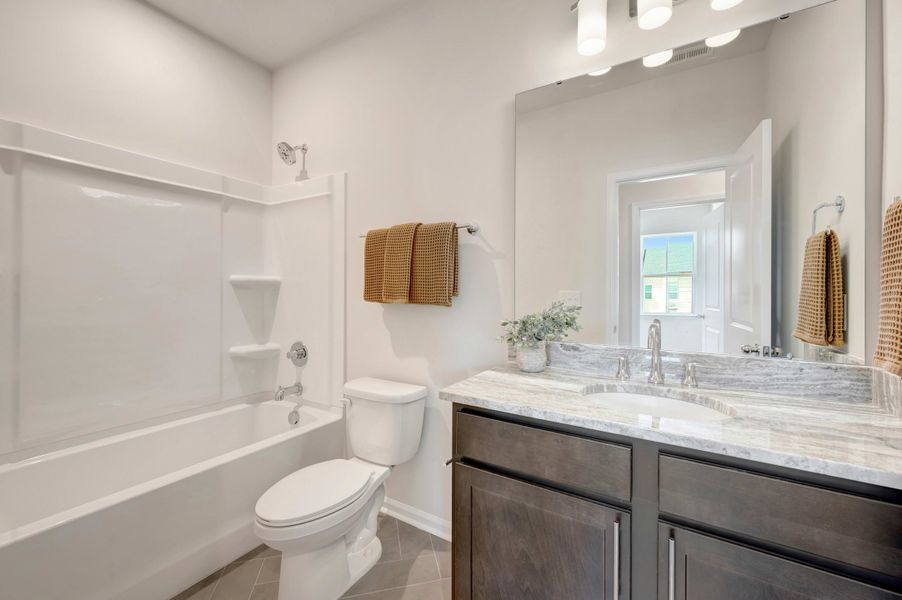 Representative furnished interior of a home built from the Huck by Tri Pointe Homes in Twinleaf Townes, Chapel Hill (Image 16).
