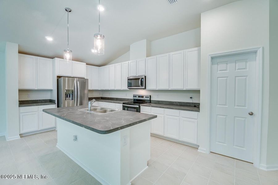 Furnished interior view inside a new home in Anabelle Island - Classic Series, Green Cove Springs (Image 6).