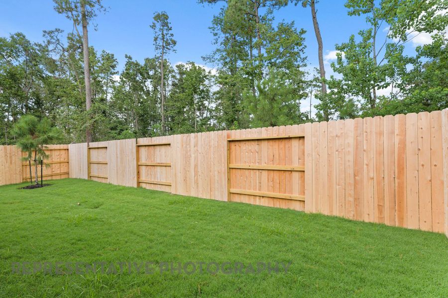 Front exterior of a new home in Evergreen, Conroe, TX, highlighting curb appeal (Image 18). Front exterior of a new home in Evergreen, Conroe, TX, highlighting curb appeal (Image 18).