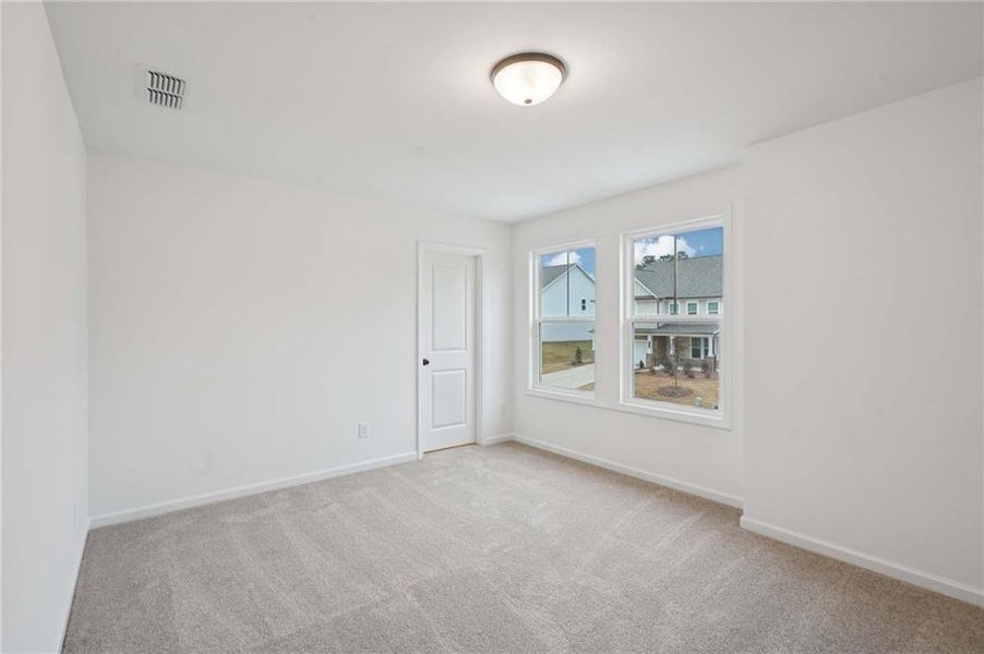 Spacious, unfurnished interior of a new home in Eastlyn Crossing, Flowery Branch (Image 13). Spacious, unfurnished interior of a new home in Eastlyn Crossing, Flowery Branch (Image 13).
