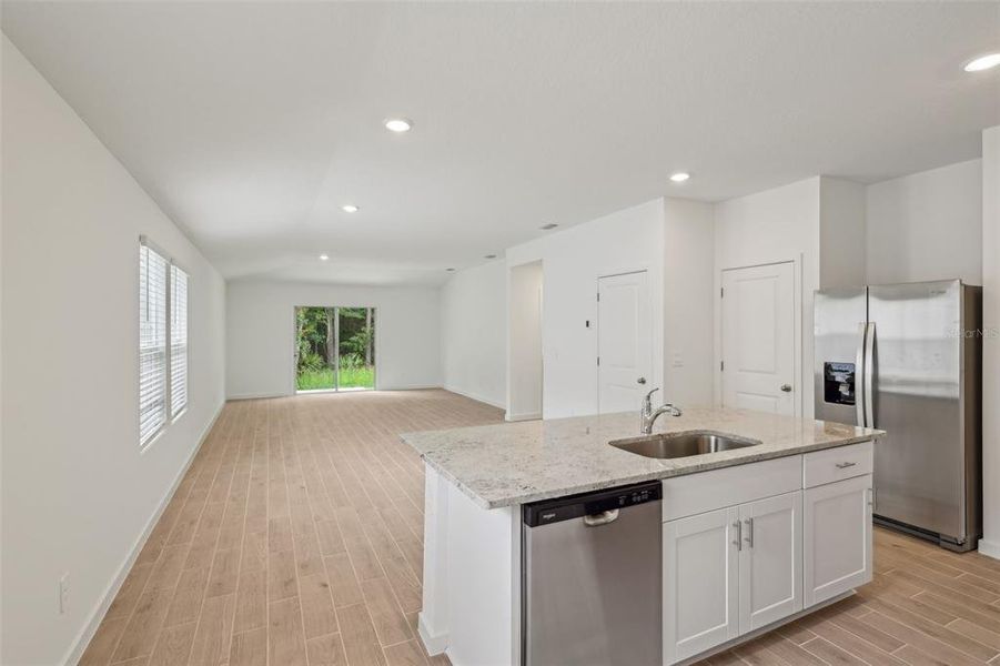 Furnished interior view inside a new home in Flagler Village - Classic Series, Palm Coast (Image 13).