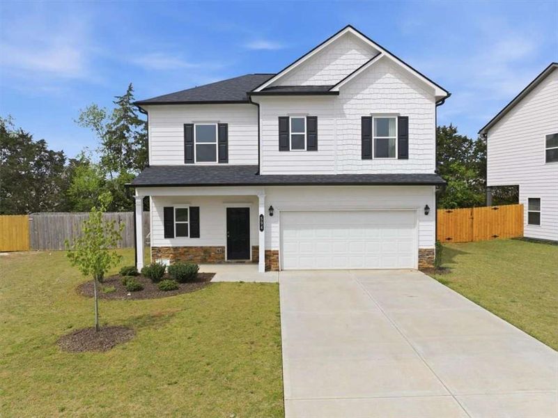 Front exterior of a new home in , Cartersville, GA, highlighting curb appeal (Image 20). Front exterior of a new home in , Cartersville, GA, highlighting curb appeal (Image 20).