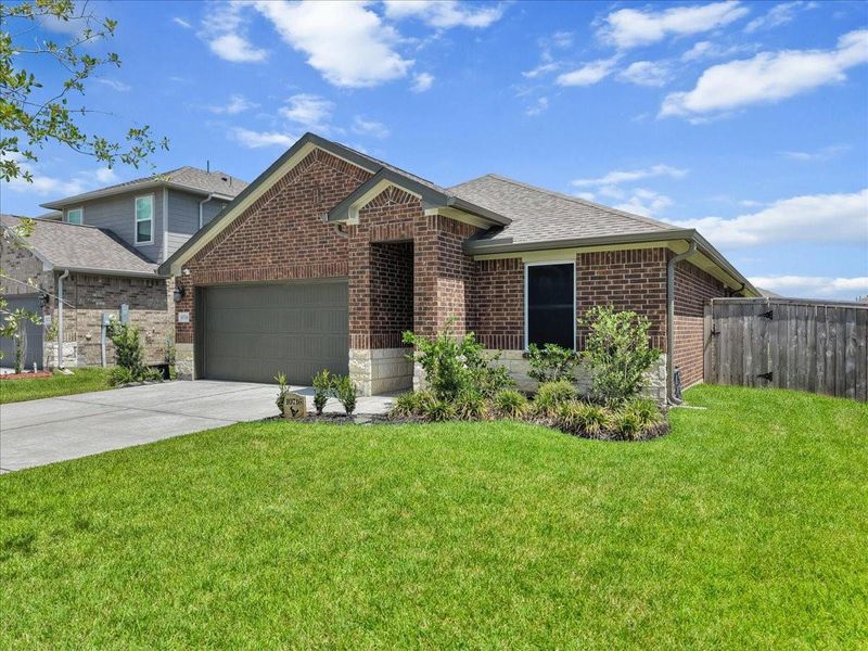 Front exterior of a new home in , Texas City, TX, highlighting curb appeal (Image 20). Front exterior of a new home in , Texas City, TX, highlighting curb appeal (Image 20).