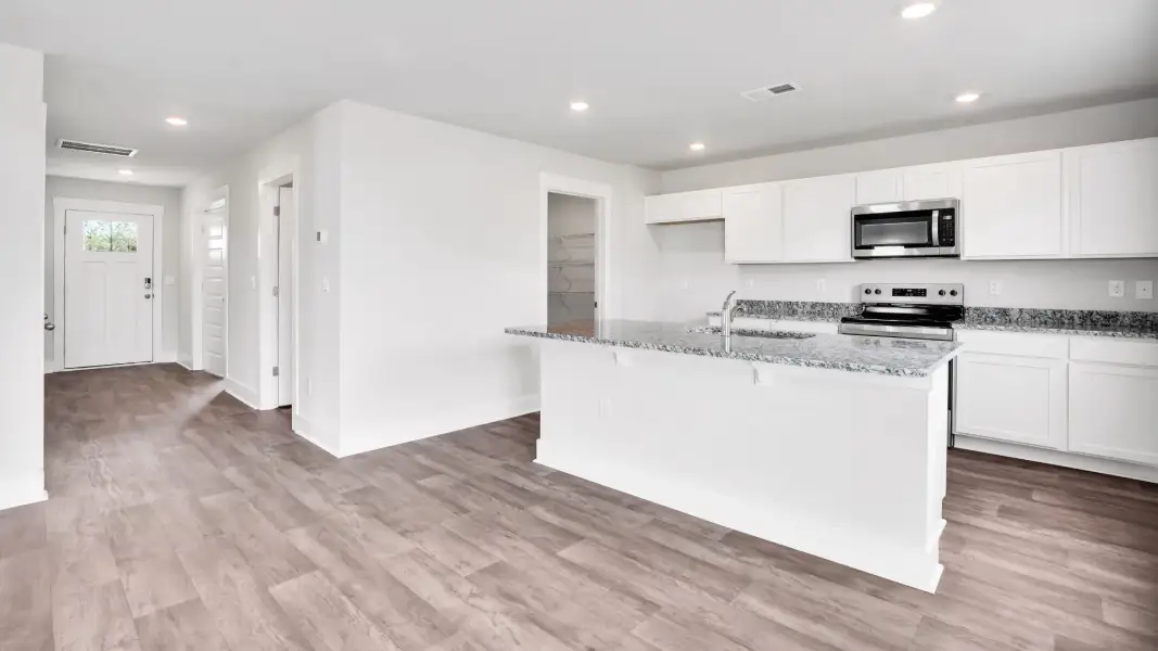 Furnished interior view inside a new home in Saltgrass Landing, Winnabow (Image 10).