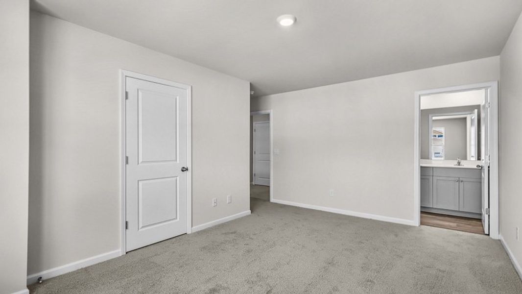 Spacious, unfurnished interior of a new home in Edinborough Townes, Gibsonville (Image 11).
