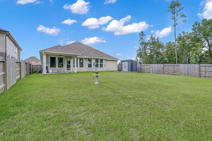 Exterior details and patio area of a home in Moran Ranch, Willis (Image 18). Exterior details and patio area of a home in Moran Ranch, Willis (Image 18).