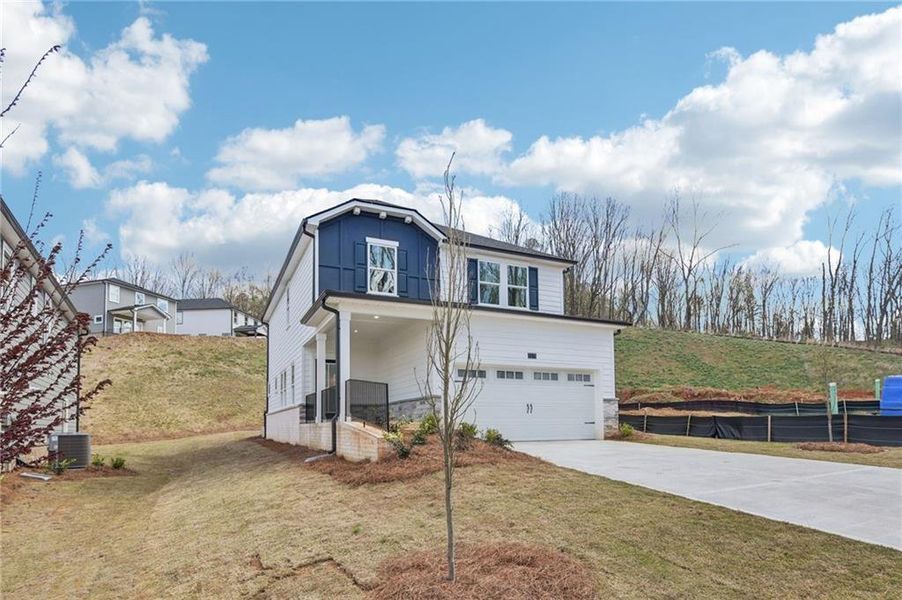 Front exterior of a new home in Hemingway - Reserve Series, Cumming, GA, highlighting curb appeal (Image 27).