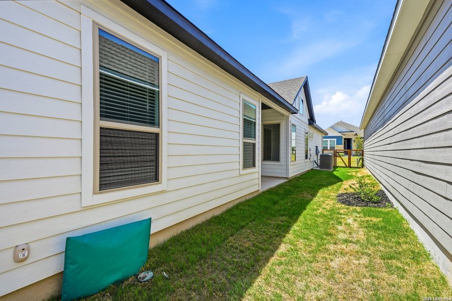 Exterior details and patio area of a home in The Crossvine, Schertz (Image 3).