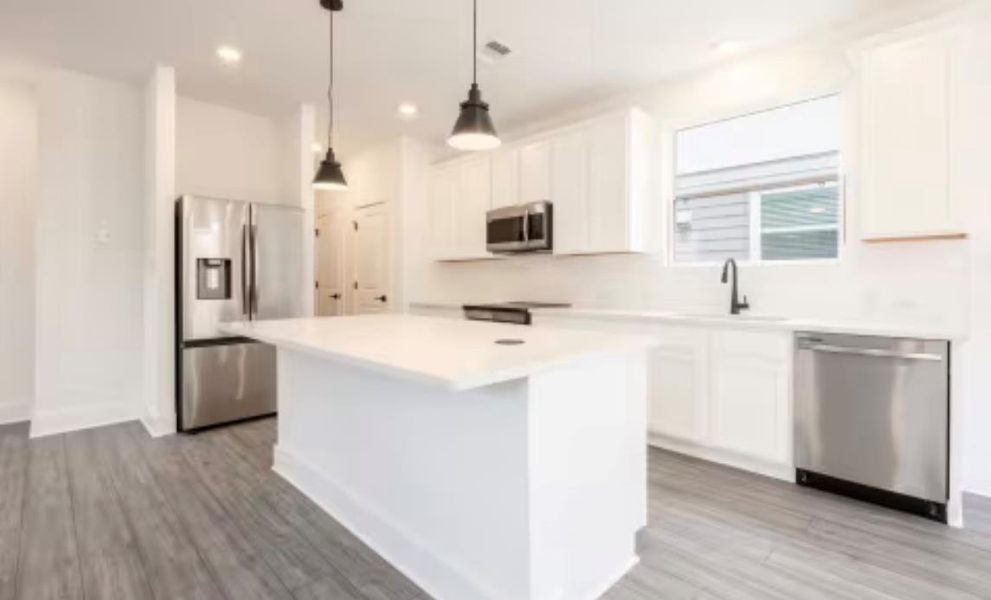 Furnished interior view inside a new home in Ryegrass Collection – Freedom at Anthem, Kyle (Image 5).