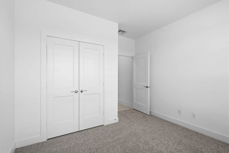 Spacious, unfurnished interior of a new home in Meridiana, Manvel (Image 14).