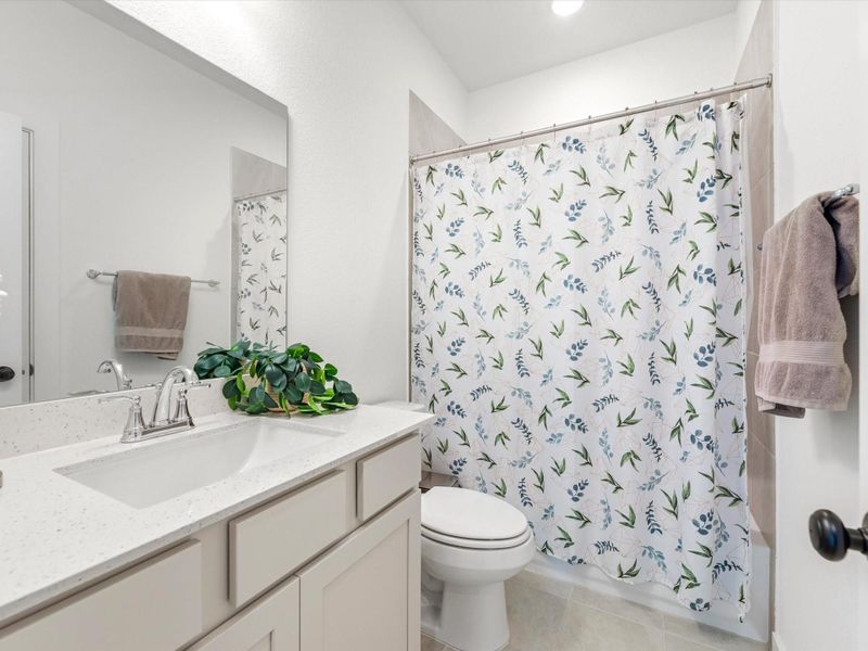 Upstairs full bath. Upstairs full bath.