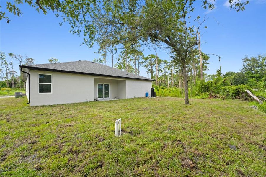 Exterior details and patio area of a home in , North Port (Image 3).