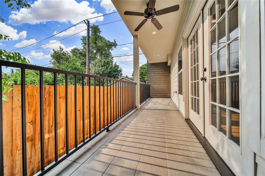 French Windows off the living space open up to a covered porch.