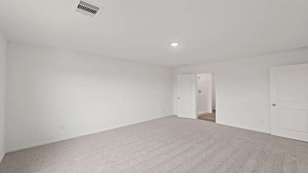 Representative unfurnished interior of a home built from the Davis by D.R. Horton in Lake Conroe Cove, Willis (Image 23).