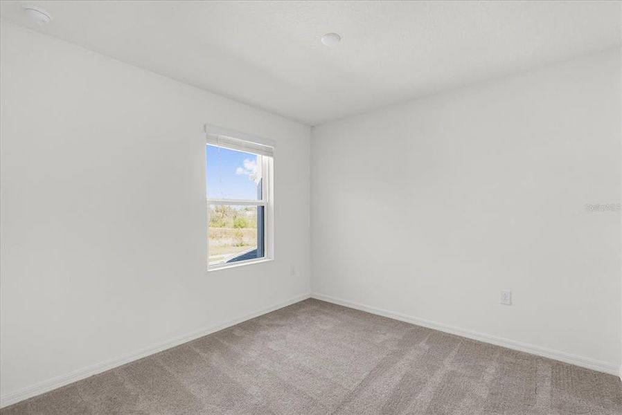 Spacious, unfurnished interior of a new home in Reserve at Forest Lake Townhomes, Lake Wales (Image 13).