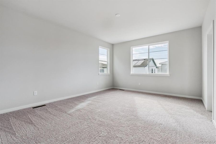 Spacious, unfurnished interior of a new home in Floret Collection at Parkdale Commons, Lafayette (Image 13).