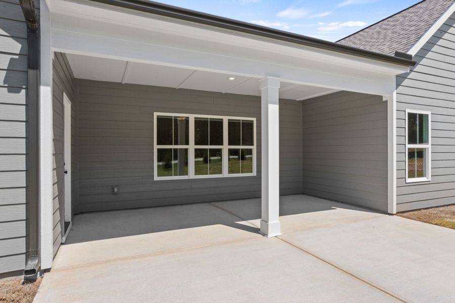 Exterior details and patio area of a home in Cherokee Knoll, Williamston (Image 4). Exterior details and patio area of a home in Cherokee Knoll, Williamston (Image 4).