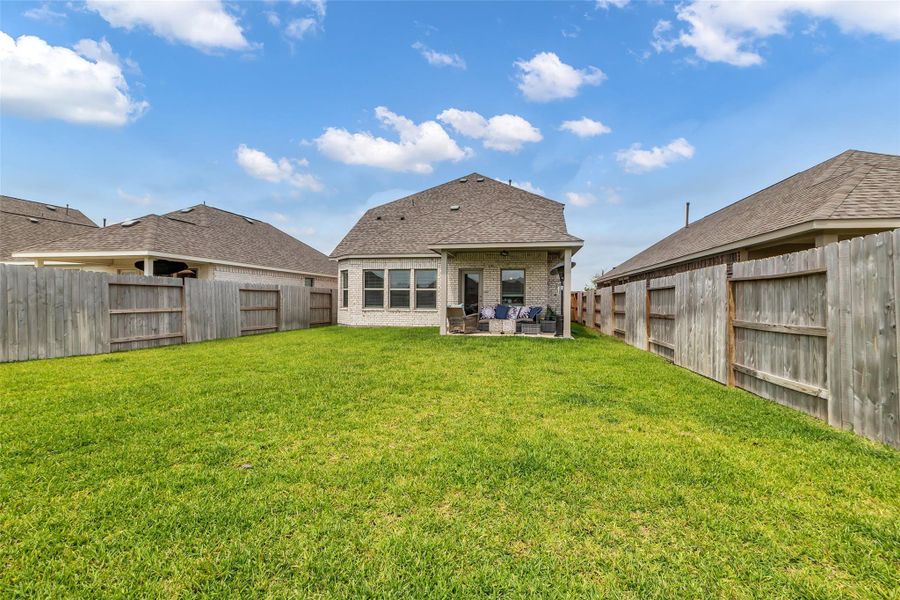 Front exterior of a new home in Marvida, Cypress, TX, highlighting curb appeal (Image 20). Front exterior of a new home in Marvida, Cypress, TX, highlighting curb appeal (Image 20).