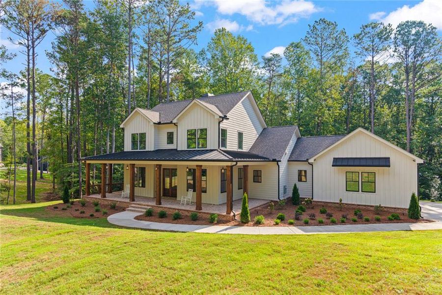 Front exterior of a new home in , Ball Ground, GA, highlighting curb appeal (Image 2).