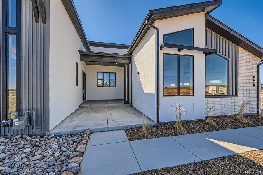 Front exterior of a new home in , Parker, CO, highlighting curb appeal (Image 23).