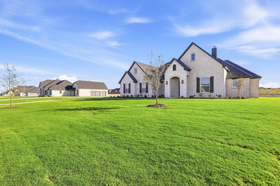 Front exterior of a new home in Aledo Heights - Aledo ISD, Aledo, TX, highlighting curb appeal (Image 24).
