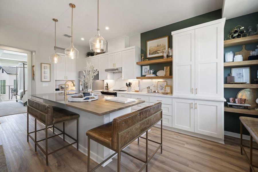 The kitchen is designed for great conversations while you cook. The kitchen is designed for great conversations while you cook.