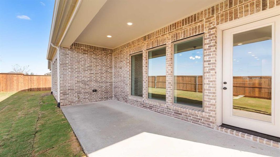 Exterior details and patio area of a home in North Sky 55', Celina (Image 4). Exterior details and patio area of a home in North Sky 55', Celina (Image 4).