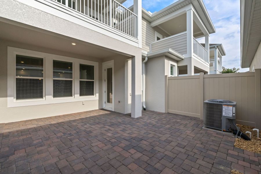 Representative exterior details of a home built from the Edison by Rockwell Homes in Harvest at Ovation - Townhomes, Winter Garden (Image 49). Representative exterior details of a home built from the Edison by Rockwell Homes in Harvest at Ovation - Townhomes, Winter Garden (Image 49).