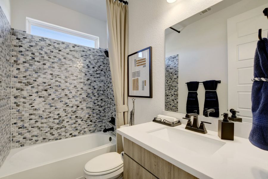 Representative furnished interior of a home built from the Jester by Scott Felder Homes in Prominence, San Antonio (Image 16).