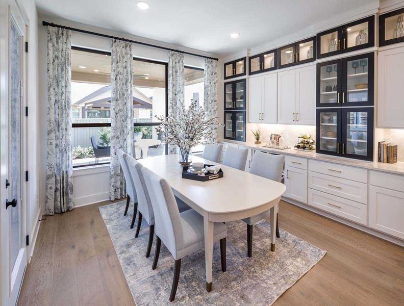 Representative furnished interior of a home built from the 222G by Highland Homes in Quail Hollow, Rockwall (Image 42).