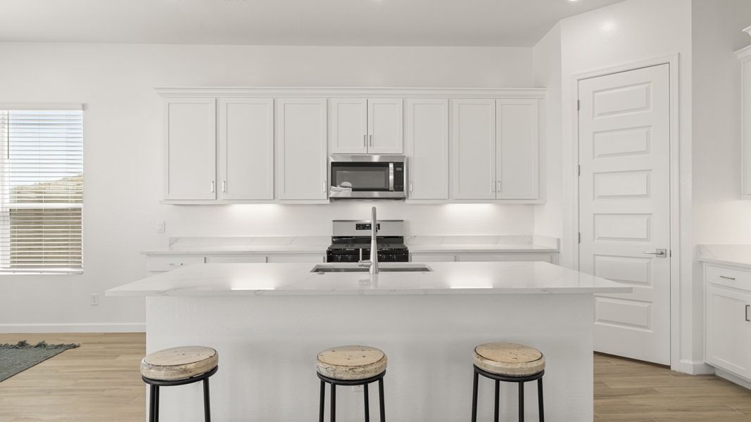Representative furnished interior of a home built from the Crow by D.R. Horton in Apache Farms, Buckeye (Image 10).