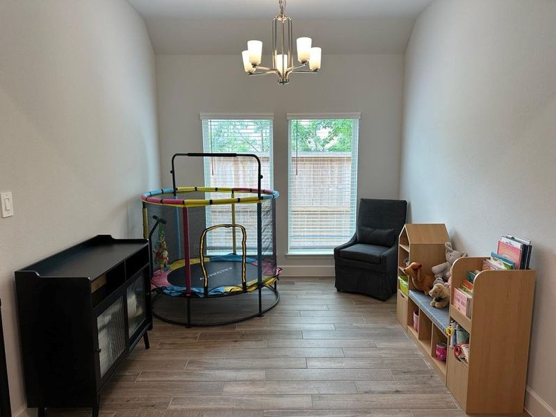 Furnished interior view inside a new home in Grand Central Park 45', Conroe (Image 5).