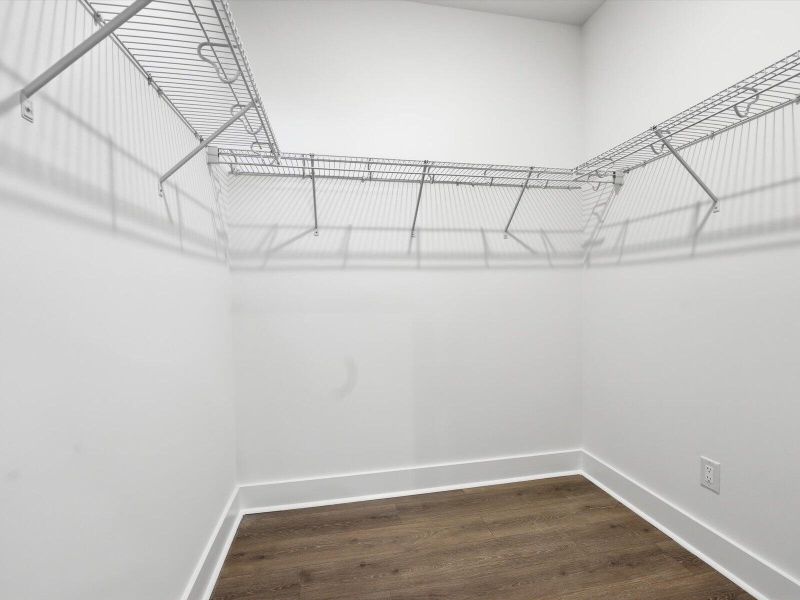 Spacious, unfurnished interior of a new home in The Coves at Lakes of Cane Bay, Summerville (Image 26).