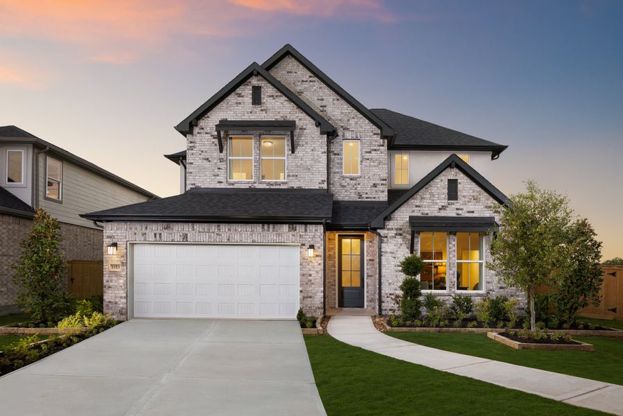Front exterior of a home in the Raburn Reserve community, located in Tomball, TX (Image 16). Front exterior of a home in the Raburn Reserve community, located in Tomball, TX (Image 16).
