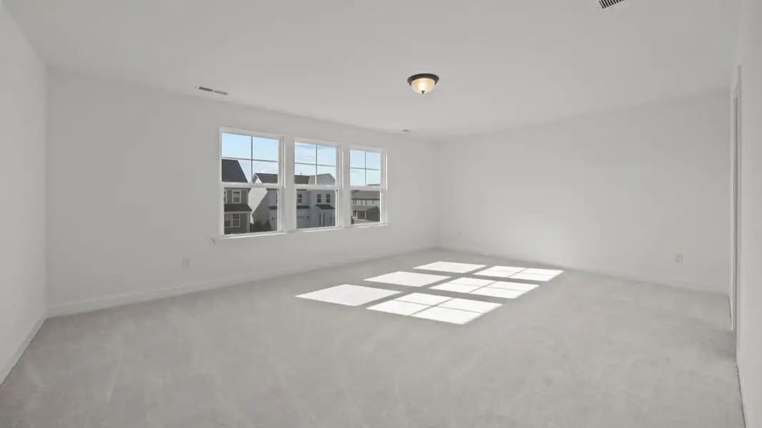 The Burton Plan in Lakeside Glen by DBR Homes in York, SC -Primary Bedroom