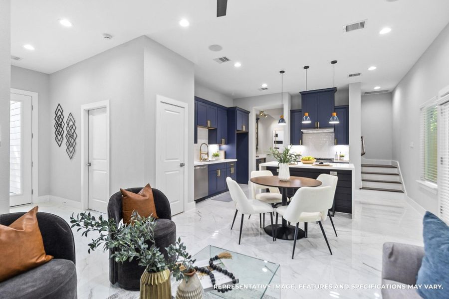 The deep navy cabinetry with gold hardware brings such a sophisticated pop to your kitchen—you can’t help but smile every time you walk in.