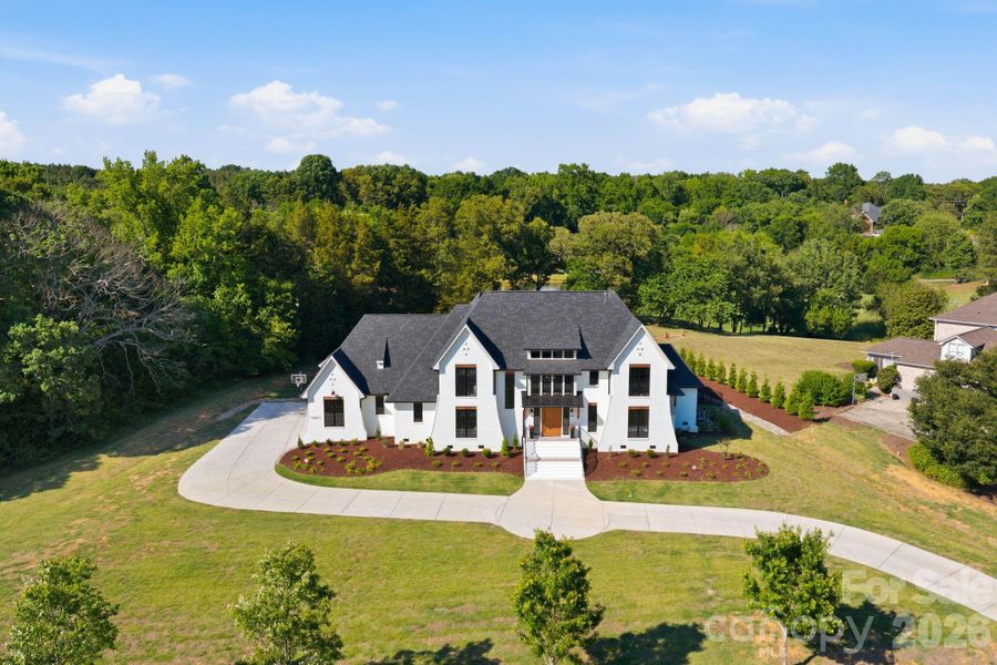 Front exterior of a new home in , Davidson, NC, highlighting curb appeal (Image 2). Front exterior of a new home in , Davidson, NC, highlighting curb appeal (Image 2).