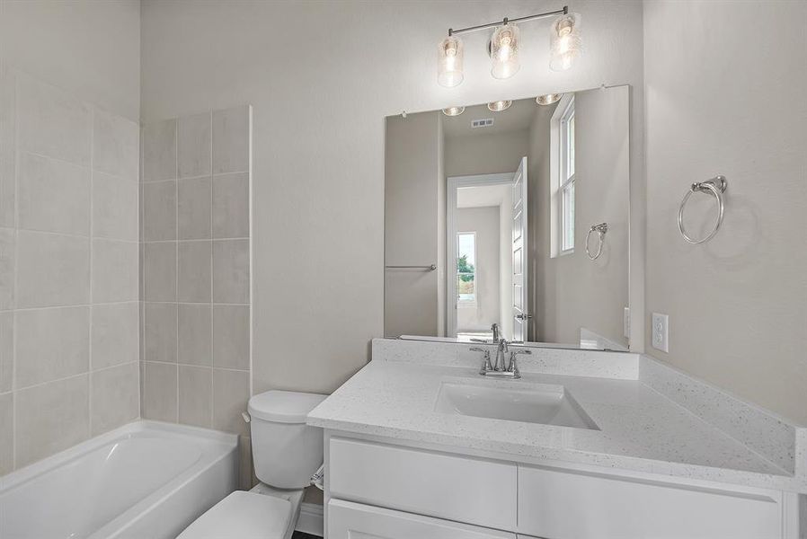 Furnished interior view inside a new home in Eagle Estates, Cross Timber (Image 8).