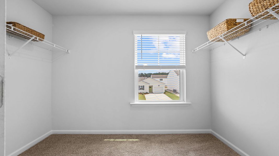 Spacious, unfurnished interior of a new home in The Groves at Bees Creek, Ridgeland (Image 19). Spacious, unfurnished interior of a new home in The Groves at Bees Creek, Ridgeland (Image 19).